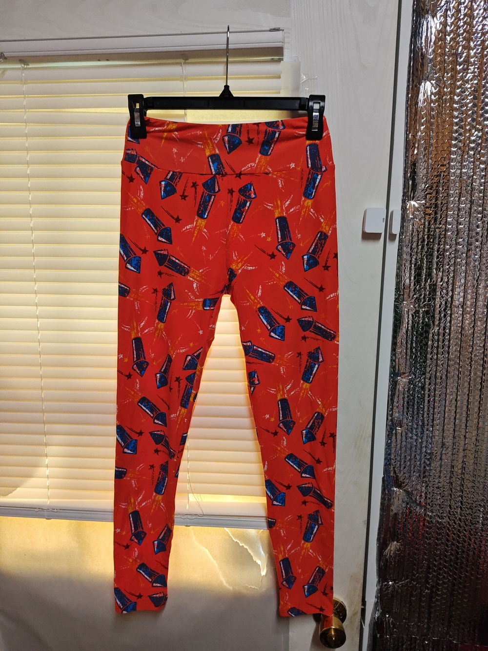 LuLaRoe Red Leggings with Blue Rocket Print